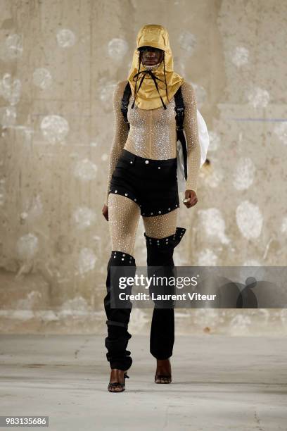 Model walks the runway during the 1017 ALYX 9SM Menswear Spring/Summer 2019 show as part of Paris Fashion Week on June 24, 2018 in Paris, France.