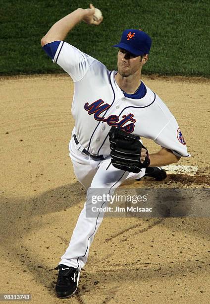 John Maine of the New York Mets delivers a pitch against the Florida Marlins on April 7, 2010 at Citi Field in the Flushing neighborhood of the...