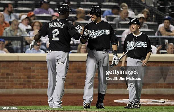 Hanley Ramirez of the Florida Marlins celebrates his fifth inning home run against the New York Mets with teammate Jorge Cantu on April 7, 2010 at...