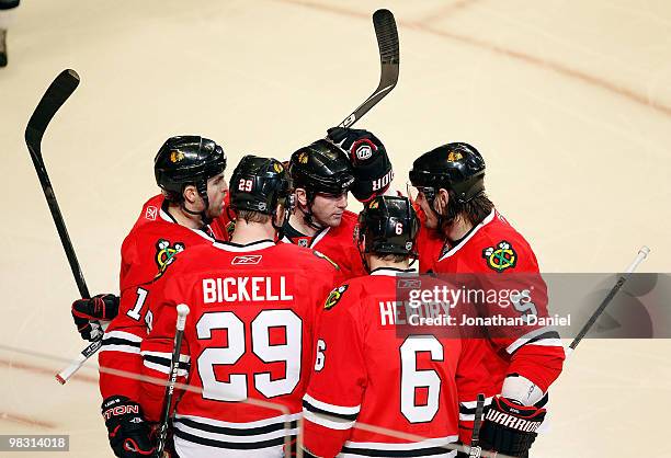 Andrew Ladd, Bryan Bickell, John Madden, Jordan Hendry and Brent Sopel of the Chicago Blackhawks celebrate a first period goal against the St. Louis...