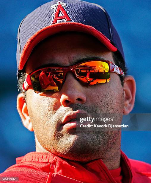 Kendry Morales of the Los Angeles Angels of Anaheim looks at his teammates during batting practice prior to their game against the Minnesota Twins at...