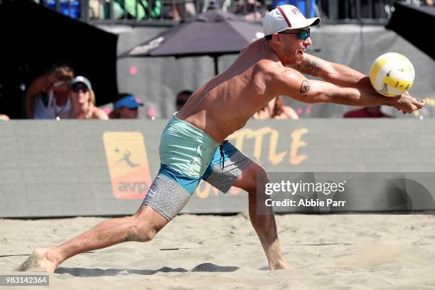 Phil Dalhausser pumps the ball while competing against Taylor Crabb and Jake Gibb during the Men's Championship game of the AVP Seattle Open at Lake...