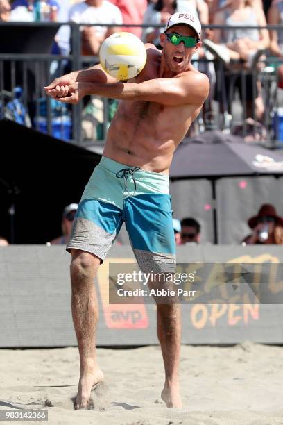 Phil Dalhausser pumps the ball while competing against Taylor Crabb and Jake Gibb during the Men's Championship game of the AVP Seattle Open at Lake...