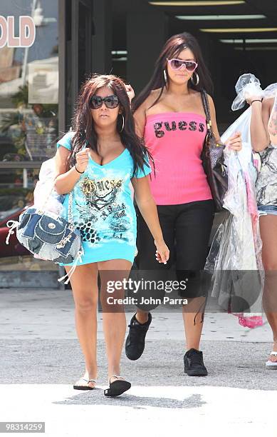 Nicole 'Snooki' Polizzi and Jenni 'JWoww' Farley are seen on April 7, 2010 in Miami Beach, Florida.