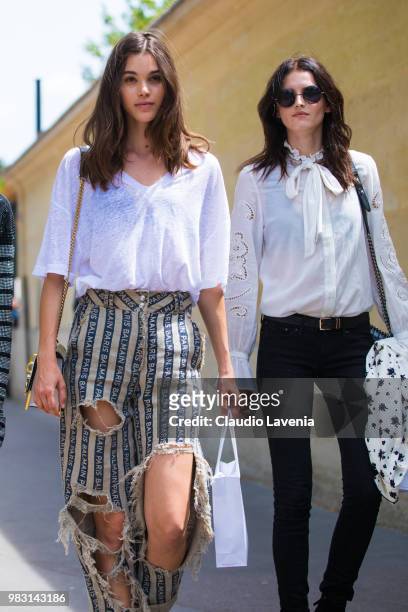 Model Pauline Hoarau , wearing white t shirt and Balmain pants, is seen in the streets of Paris after the Balmain show, during Paris Men's Fashion...