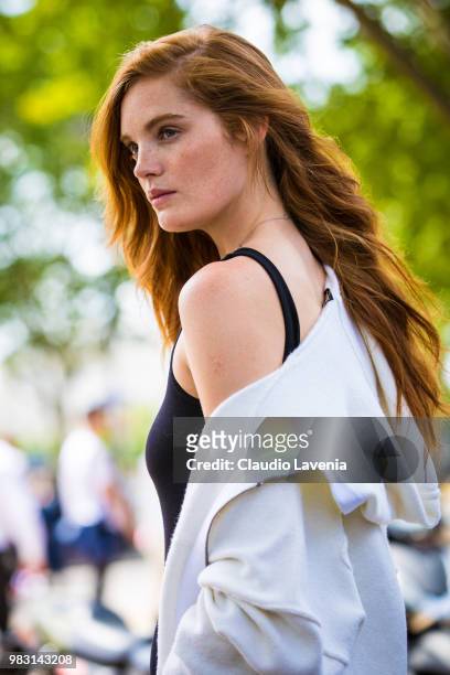 Model Alexina Graham, wearing black top and white sweater, is seen in the streets of Paris after the Balmain show, during Paris Men's Fashion Week...