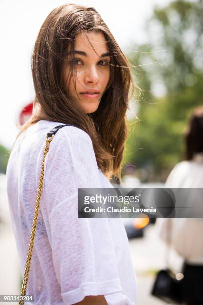 Model Pauline Hoarau, wearing white t shirt, is seen in the streets of Paris after the Balmain show, during Paris Men's Fashion Week Spring/Summer...