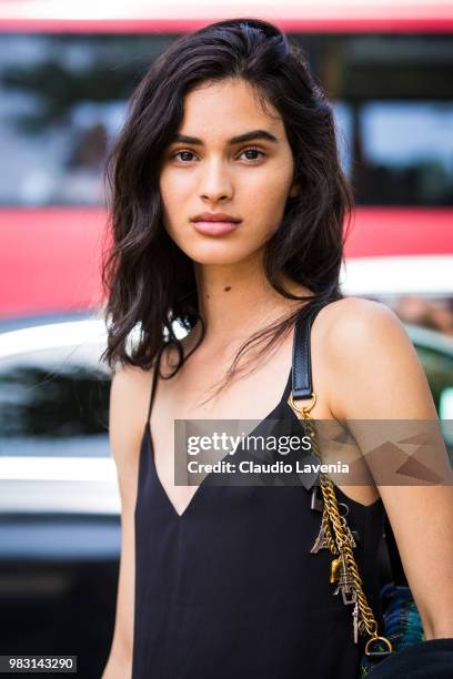 Model, wearing black shirt, is seen in the streets of Paris after the Balmain show, during Paris Men's Fashion Week Spring/Summer 2019 on June 24,...