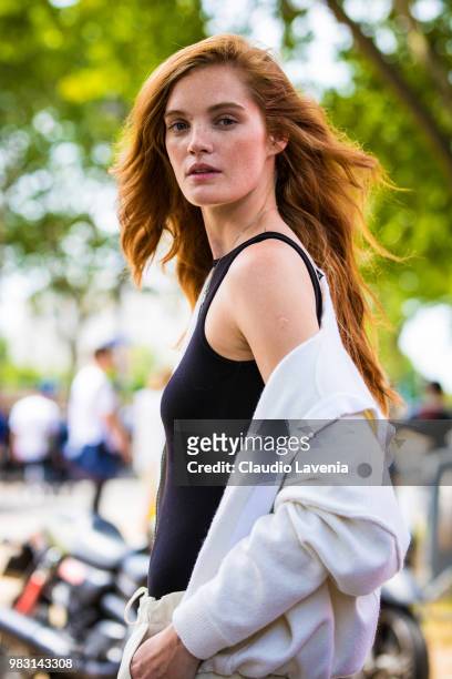 Model Alexina Graham, wearing black top and white sweater, is seen in the streets of Paris after the Balmain show, during Paris Men's Fashion Week...