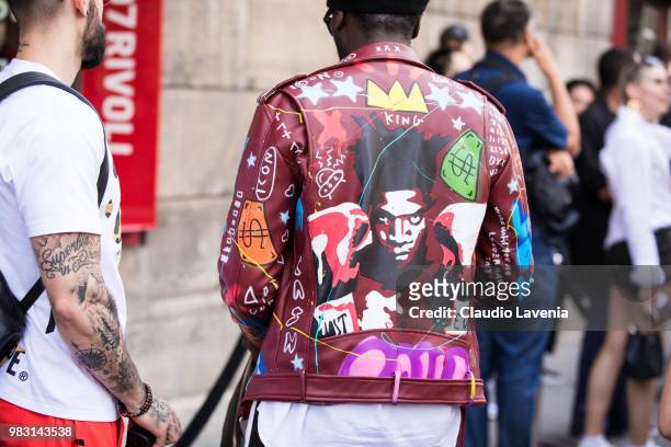 Fashion detail of red leather jacket, is seen in the streets of Paris after the Y-3 show, during Paris Men's Fashion Week Spring/Summer 2019 on June...