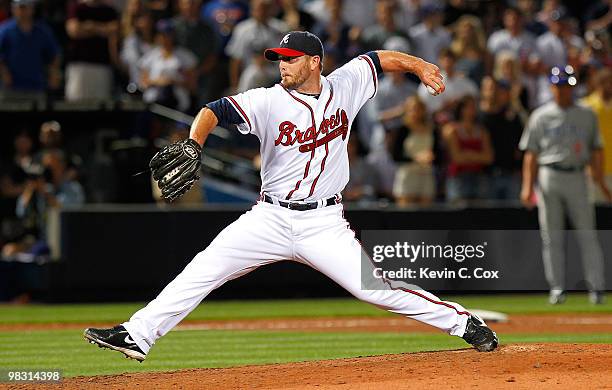 Reliever Billy Wagner of the Atlanta Braves tosses the final pitch to give the Braves a 3-2 win over the Chicago Cubs at Turner Field on April 7,...