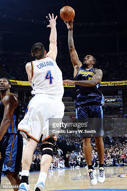 Smith of the Denver Nuggets shoots over Nick Collison of the Oklahoma City Thunder during the game at the Ford Center on April 7, 2010 in Oklahoma...