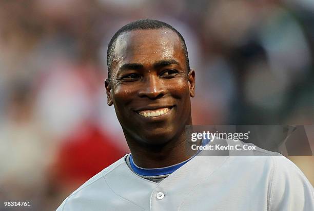 Alfonso Soriano of the Chicago Cubs enjoys a laugh as he heads into the outfield during the game against the Atlanta Braves at Turner Field on April...