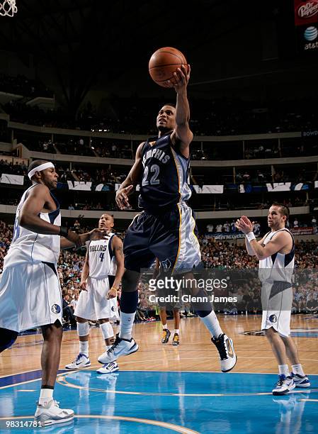 Rudy Gay of the Memphis Grizzlies gets into the lane for the layup against Brendan Haywood of the Dallas Mavericks during a game at the American...