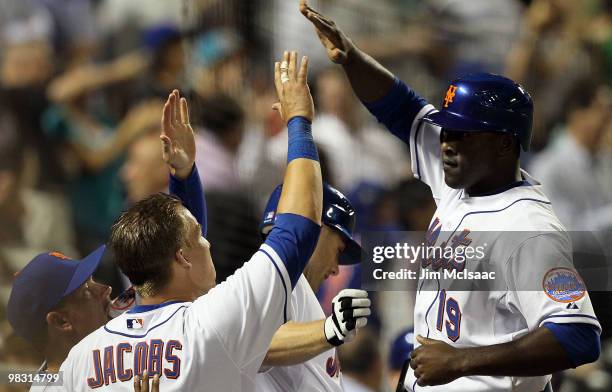 Gary Matthews Jr of the New York Mets celebrates after scoring the tying run in the eighth inning on a bases loaded balk against the Florida Marlins...