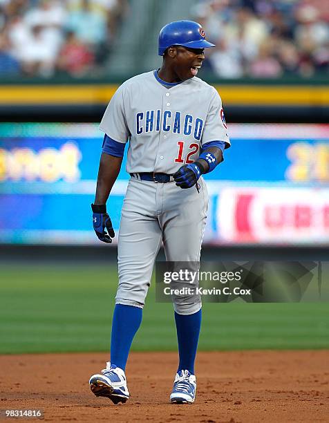 Alfonso Soriano of the Chicago Cubs watches a pitch as he stands between second and third base against the Atlanta Braves at Turner Field on April 7,...