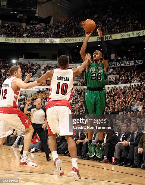 Ray Allen of the Boston Celtics takes the shot over DeMar DeRozan of the Toronto Raptors during a game on April 7, 2010 at the Air Canada Centre in...