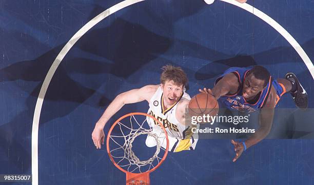 Troy Murphy of the Indiana Pacers battles Earl Baron of the New York Knicks at Conseco Fieldhouse on April 7, 2010 in Indianapolis, Indiana. NOTE TO...