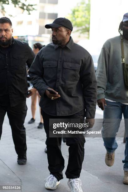 Kanye West is seen on the street during Paris Men's Fashion Week S/S 2019 wearing all-black on June 24, 2018 in Paris, France.