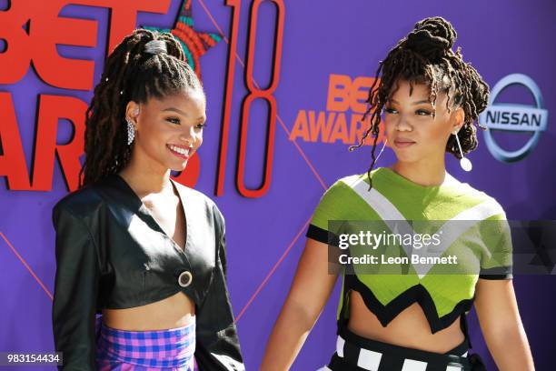 Halle Bailey and Chloe Bailey of Chloe X Halle attend the 2018 BET Awards at Microsoft Theater on June 24, 2018 in Los Angeles, California.