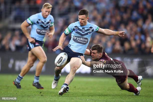 Damien Cook of the Blues kicks during game two of the State of Origin series between the New South Wales Blues and the Queensland Maroons at ANZ...