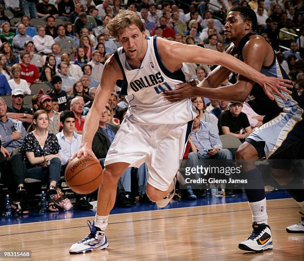Dirk Nowitzki of the Dallas Mavericks drives against Rudy Gay of the Memphis Grizzlies during a game at the American Airlines Center on April 7, 2010...