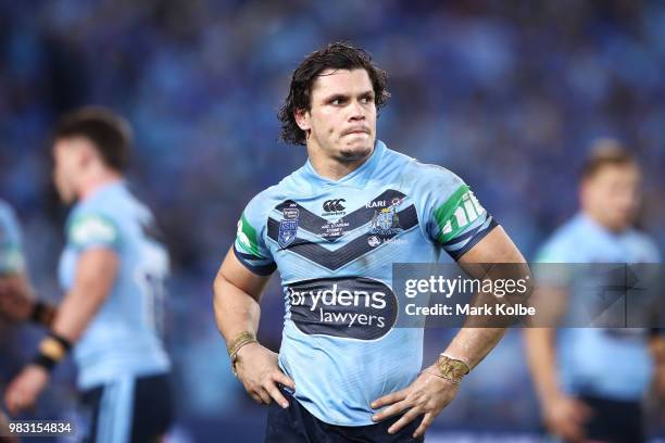 James Roberts of the Blues looks dejected as he leaves the field after being sin-binned during game two of the State of Origin series between the New...