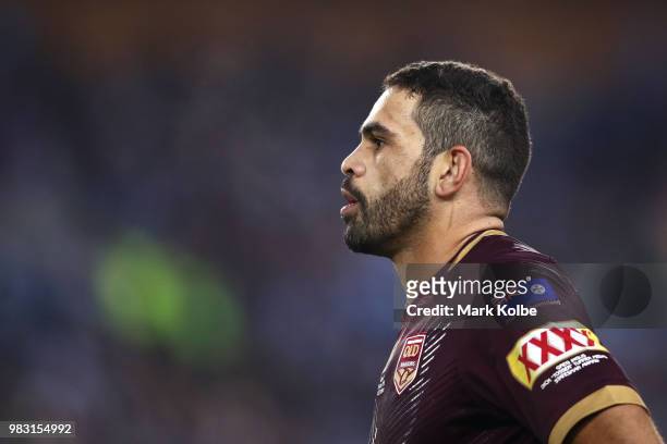 Greg Inglis of the Maroons watches on during game two of the State of Origin series between the New South Wales Blues and the Queensland Maroons at...