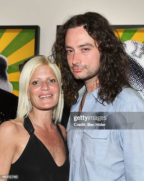 Lizzie Grubman and Actor Constantine Maroulis attend the opening of "American Boarders" by Paul Rusconi at Stellan Holm Gallery on April 7, 2010 in...