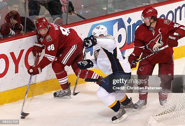 Wojtek Wolski of the Phoenix Coyotes attempts to center the puck during the second period of the NHL game against the Nashville Predators at...