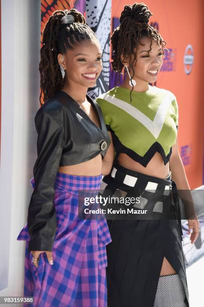 Halle Bailey and Chloe Bailey attend the 2018 BET Awards at Microsoft Theater on June 24, 2018 in Los Angeles, California.