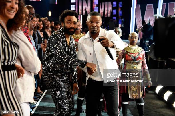 Donald Glover and host Jamie Foxx attend the 2018 BET Awards at Microsoft Theater on June 24, 2018 in Los Angeles, California.
