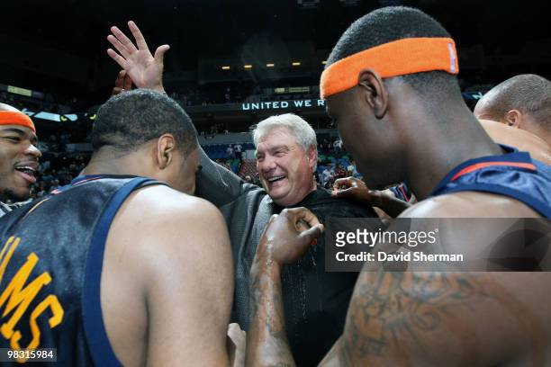 Head coach Don Nelson of the Golden State Warriors celebrates with his players after becoming the all-time NBA winningest coach with 1,333 wins with...