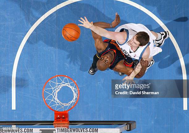 Kevin Love of the Minnesota Timberwolves goes to the basket against Anthony Tolliver of the Golden State Warriors during the game on April 7, 2010 at...