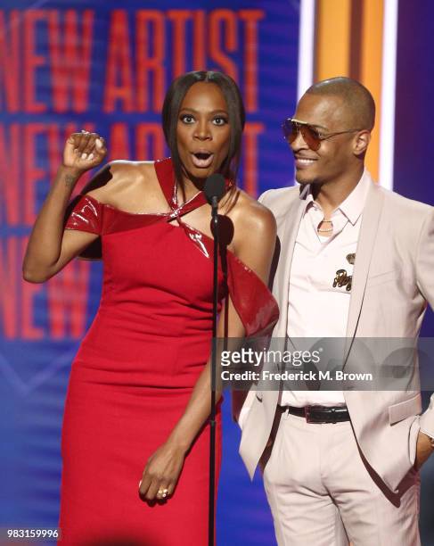 Yvonne Orji and Tip 'T.I.' Harris speak onstage at the 2018 BET Awards at Microsoft Theater on June 24, 2018 in Los Angeles, California.