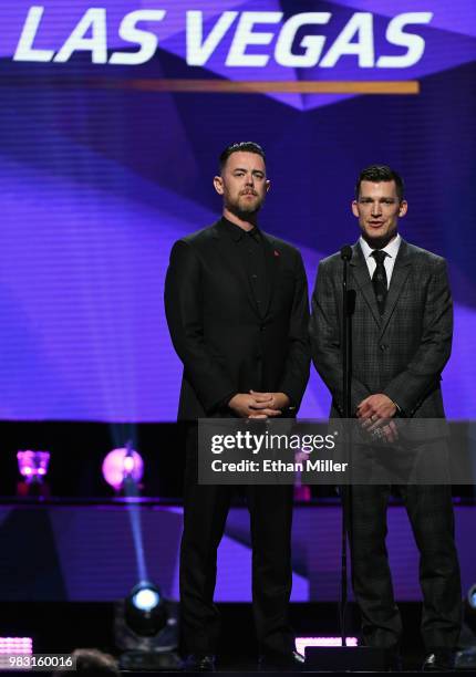 Actor Colin Hanks and former NHL player Andrew Ference present an award during the 2018 NHL Awards presented by Hulu at The Joint inside the Hard...