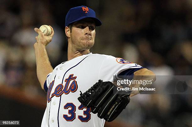 John Maine of the New York Mets delivers a pitch against the Florida Marlins on April 7, 2010 at Citi Field in the Flushing neighborhood of the...