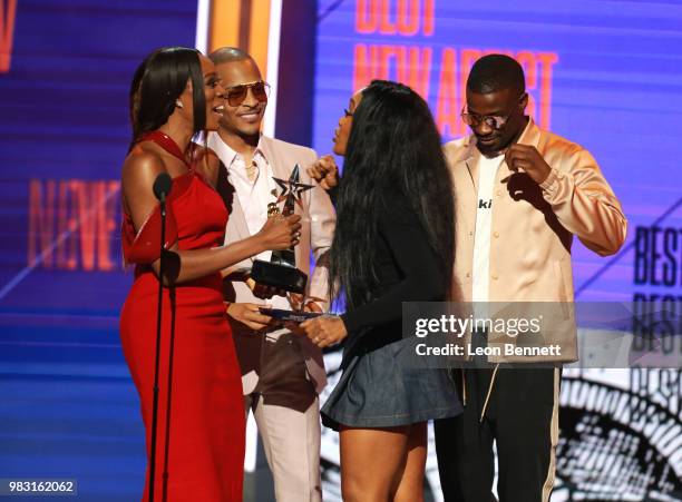 Accepts Best New Artist from Yvonne Orji and T.I. Onstage at the 2018 BET Awards at Microsoft Theater on June 24, 2018 in Los Angeles, California.