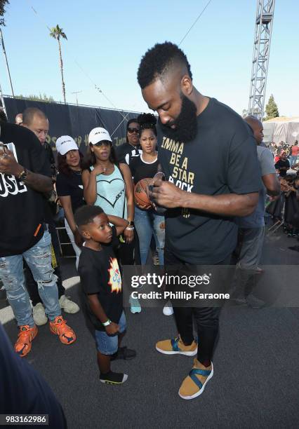 James Harden signs autographs at "Imma Be a Star" Block Party at Audubon Middle School on June 24, 2018 in Los Angeles, California.