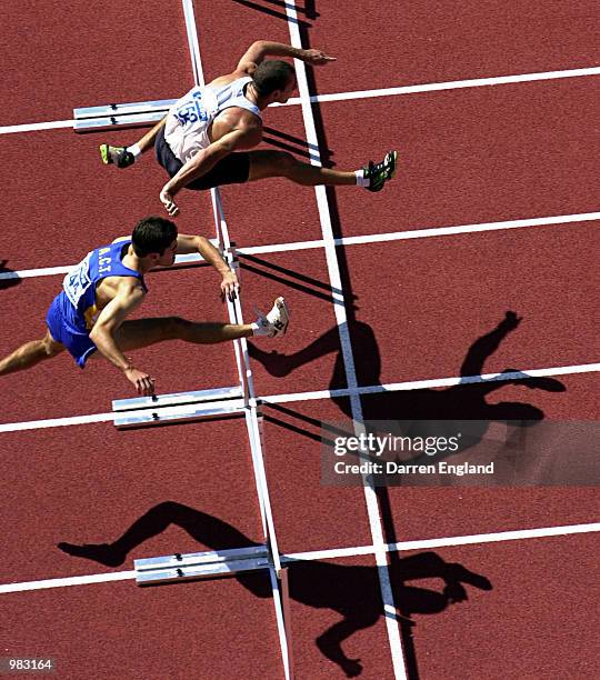 Andrew Coulter and Rohan Walker of Australia in action during the men's 110 metre Hurdles during the Decathlon competition at the Australian Track...