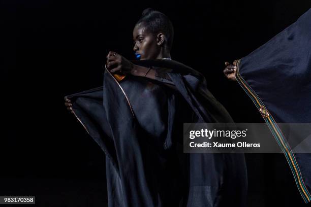 Model walks the runway during Yat Nt show on last day of the Dakar Fashion Week at the working class suburb of Keur Massar on June 24, 2018 in Dakar,...