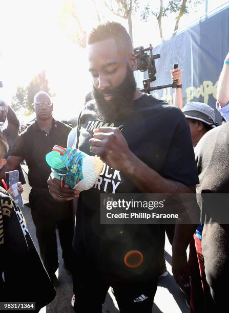 James Harden signs autographs at "Imma Be a Star" Block Party at Audubon Middle School on June 24, 2018 in Los Angeles, California.