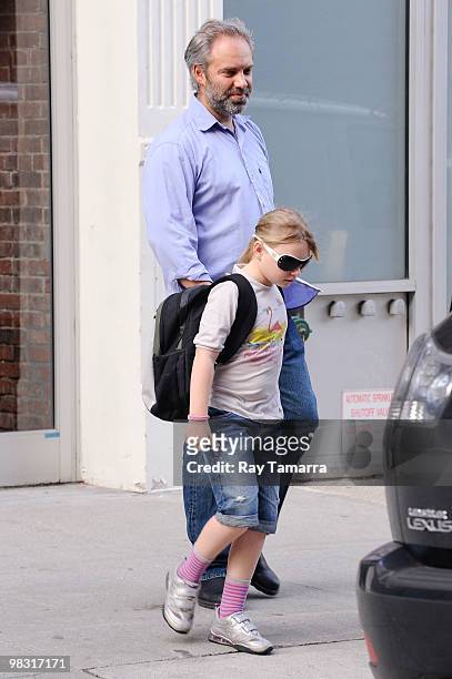 Director Sam Mendes and daughter Mia leave their apartment on April 07, 2010 in New York City.