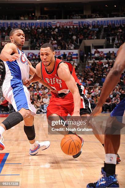 Brandon Roy of the Portland Trail Blazers dribbles against Eric Gordon of the Los Angeles Clippers at Staples Center on April 7, 2010 in Los Angeles,...