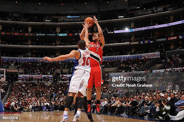 Brandon Roy of the Portland Trail Blazers shoots against Eric Gordon of the Los Angeles Clippers at Staples Center on April 7, 2010 in Los Angeles,...