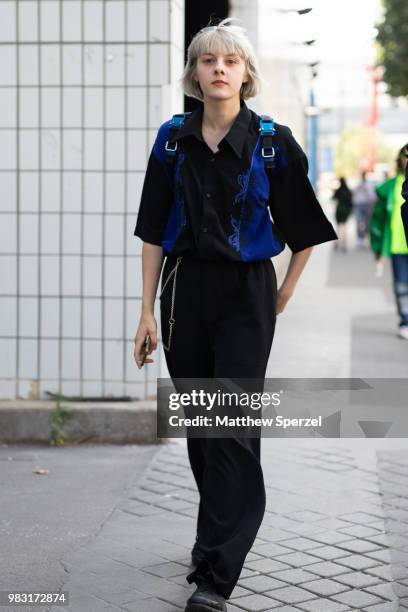 Guest is seen on the street during Paris Men's Fashion Week S/S 2019 wearing Alyx on June 24, 2018 in Paris, France.