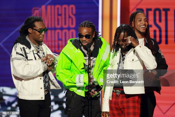 Takeoff, Quavo and Offset of Migos accept the Best Group Award onstage at the 2018 BET Awards at Microsoft Theater on June 24, 2018 in Los Angeles,...