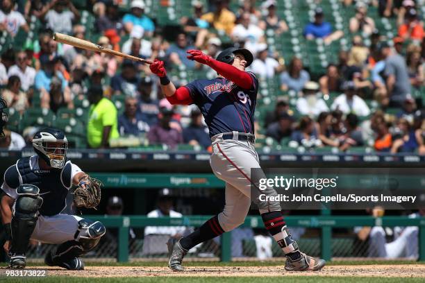 Logan Morrison of the Minnesota Twins bats during a MLB game against the Detroit Tigers at Comerica Park on June 14, 2018 in Detroit, Michigan.