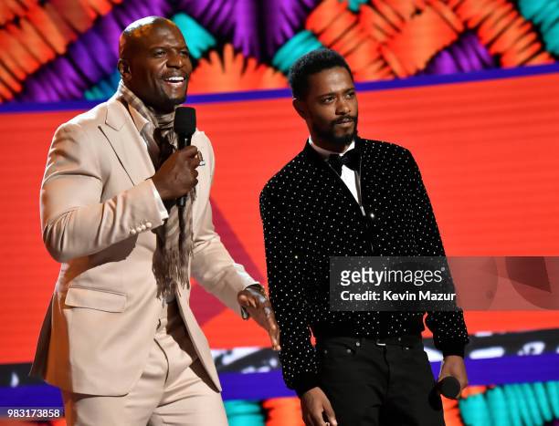 Terry Crews and Lakeith Stanfield speak onstage at the 2018 BET Awards at Microsoft Theater on June 24, 2018 in Los Angeles, California.