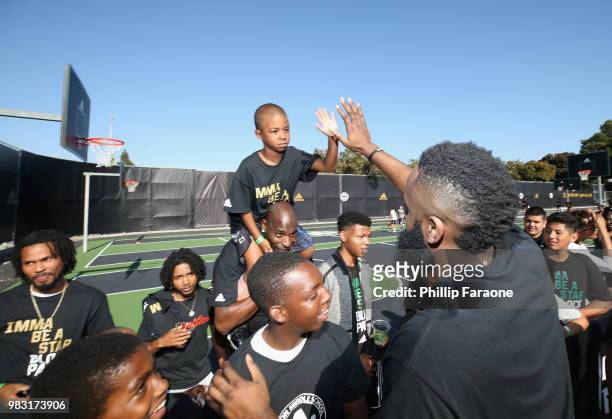 James Harden wth fans at "Imma Be a Star" Block Party at Audubon Middle School on June 24, 2018 in Los Angeles, California.